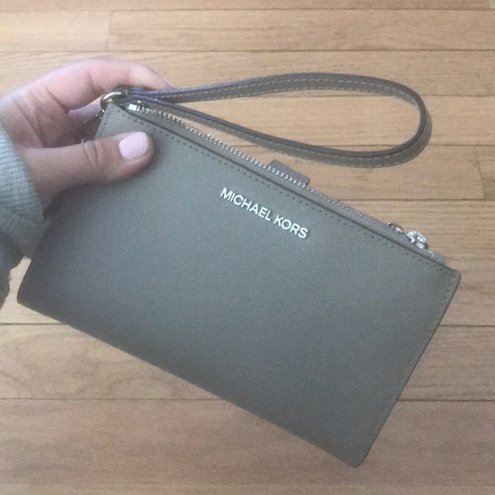 Grey Michael Kors Wristlet wallet with phone pouch